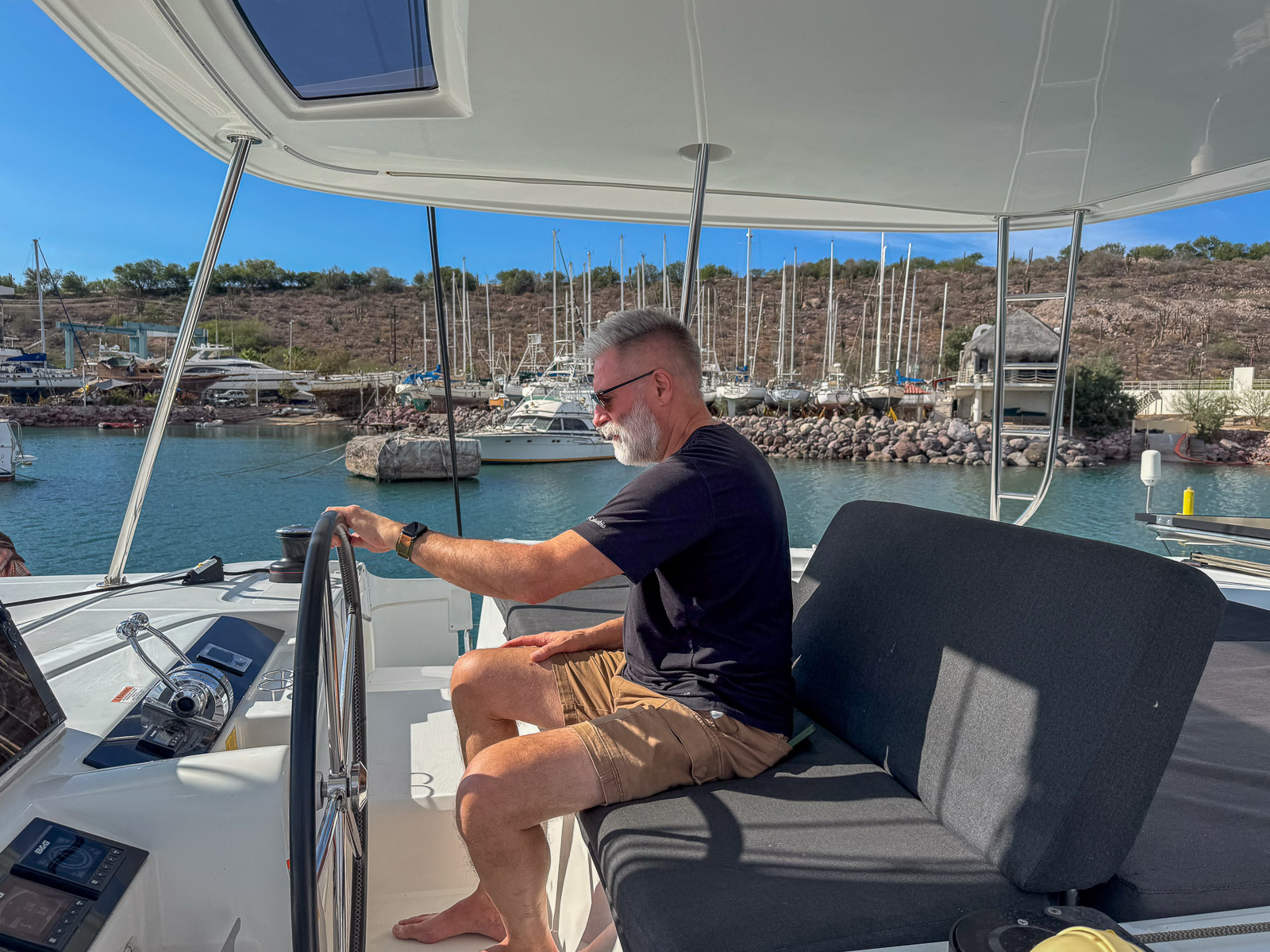 Marc driving boat